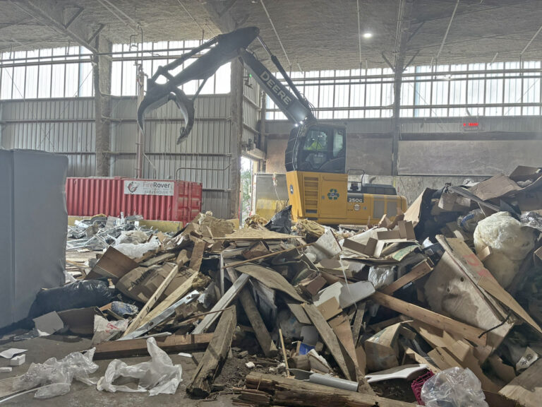 Sorting recyclables at C&D Recovery