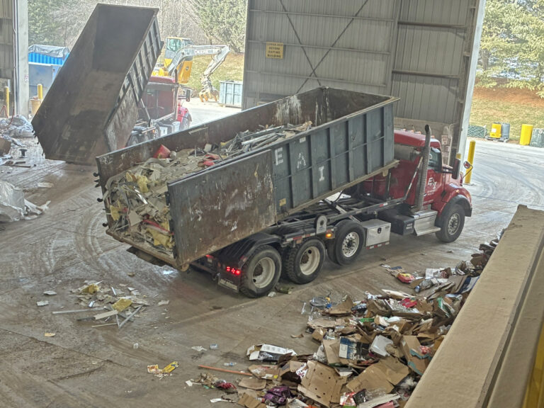 EAI Rolloff dropping off a load at C&D Recovery